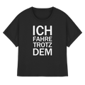 Schwarzes Bio-Womens-Rolled-Sleeves-Shirt mit dem weißen Aufdruck Ich fahre trotzdem 